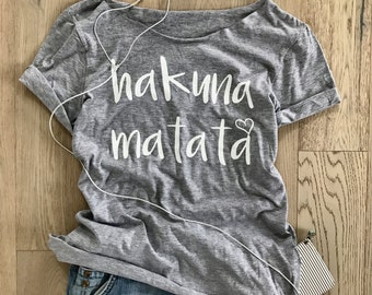 Hakuna Matata Disney Shirt. Cool T Shirt. Gift Shirt. Women's T Shirt. Women's Relaxed Fit. Women's Fun T Shirt. Wide Neck Shirt.