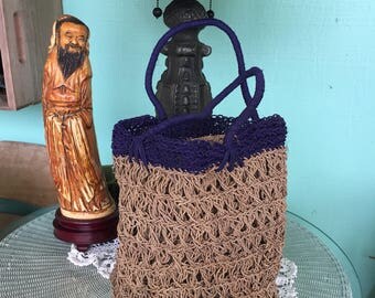 Natural fiber hobo shoulder bag.