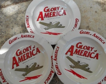 Three Vintage French Glory of America Metal Ashtrays.