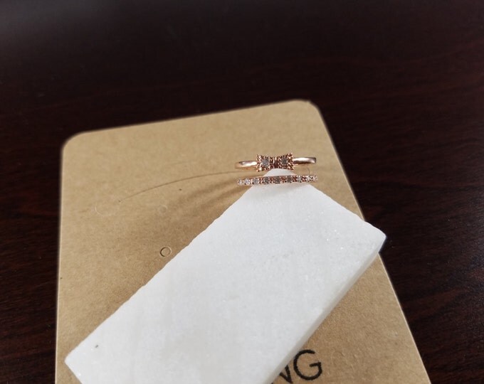 18Kgp Rose Gold double row ring with Ribbon. Nickel Free