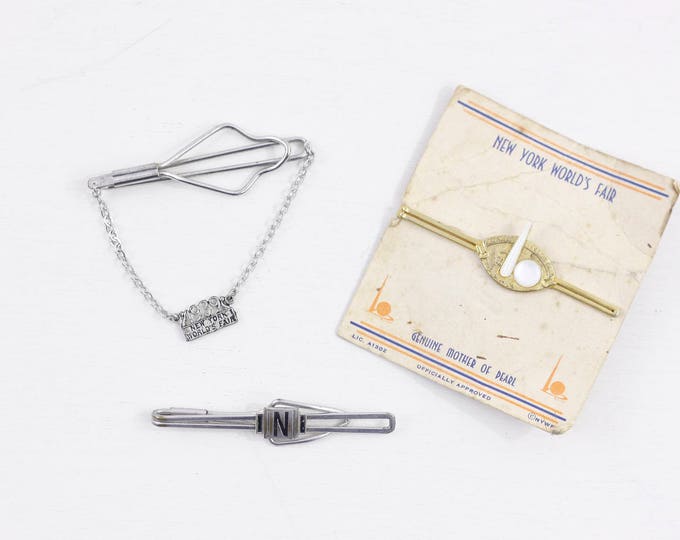 1939 Worlds Fair New York tie clips x 3, 1930s collectible Pylon and omnisphere on original stock card