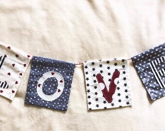 Bandierine / banner decorativi in tessuto di cotone con lettere cucite a contrasto. Personalizzabili con nome bambino e parole.
