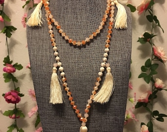 Multi tassel beige beaded necklace