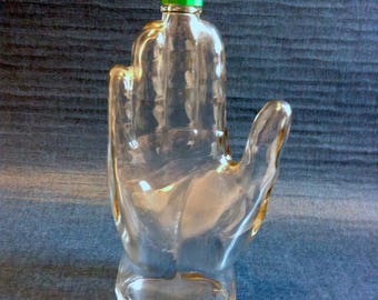 Vintage Skin Bracer Right Hand. Empty. Glass bottle with green plastic Cap. Mod, pop, Mid century Kitsch, Eames Panton era.