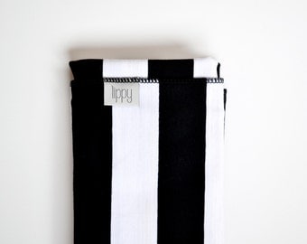 Black white baby swaddle blanket. Stripes, gender neutral, Soft stretchy knit. Size 31 by 40 inches. Made by lippy brand.