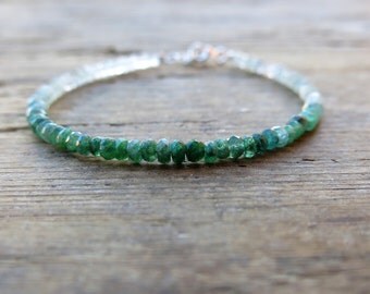 Emerald bracelet. Ombre emerald and white sapphire bracelet. Minimalist bracelet with faceted green emerald and white sapphire stones.