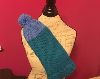 Multi blue winter hat with blue pom pom