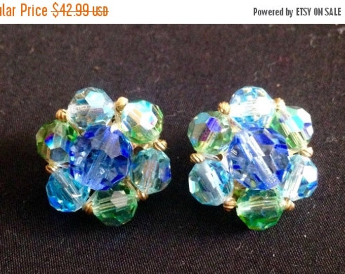 Storewide 25% Off SALE Beautiful Vintage Sky Blue Glass Crystal Rosette Clip Style Designer Cluster Earrings Featuring Iridescent Shimmering