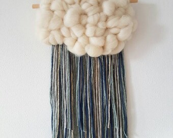 Fluffy cloud Woven Wall Hanging, nursery decor. Ivory roving and fringe of blue and grey and a little gold
