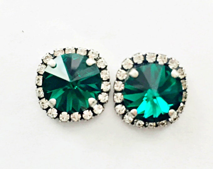 Green with envy stunning Emerald stud earrings showcase large shimmering Swarovski crystals for a glamorous look.