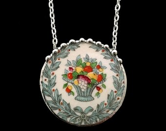 Edwardian broken china jewelry necklace laurel wreath with bow and fruit basket made from antique broken china. recycled china