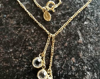 Vintage Avon gold colour necklace, with round bezel set cz gemstones, in a cluster.