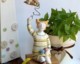 The "Dreamy Girl"-DG/01a Ragazza che lavora a maglia e gatto "volante"