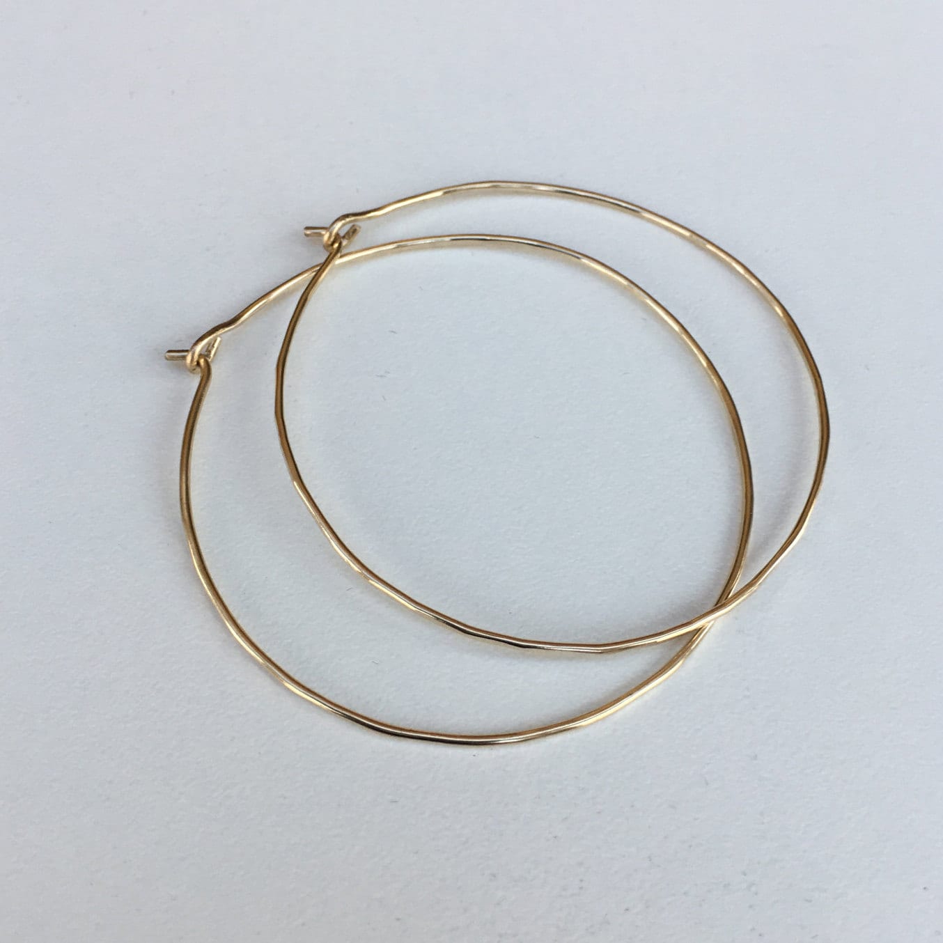 2 inch solid gold hoops 10K solid gold skinny hammered