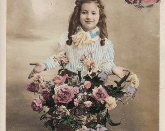 Vintage French Romantic Children postcard. Little girl with flowers. Greetings post card.
