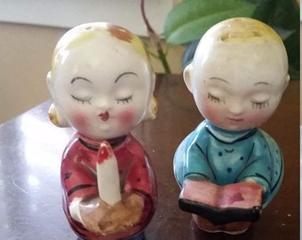 40's to 50's Girl and Boy Kneeling with Book and Candle Made in Japan. 50's Kitschy Salt and Pepper Shakers.