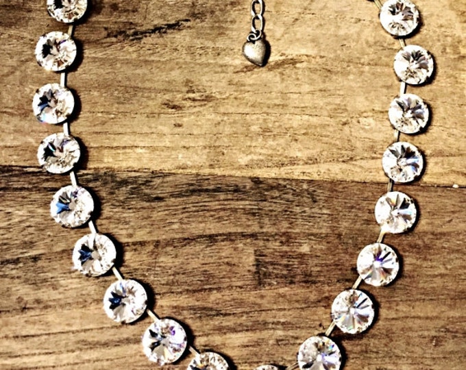 Feel confident in this classic Swarovski® crystal rivoli necklace guaranteed to be stunning, make a statement and have all eyes on you.