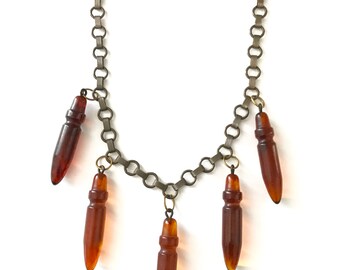 Vintage Carved Bakelite Bullet Necklace