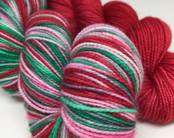 Hand dyed Christmas sock yarn perfect for your Christmas socks, hand dyed Christmas sock yarn on sparkle base with heels and toes in red soc