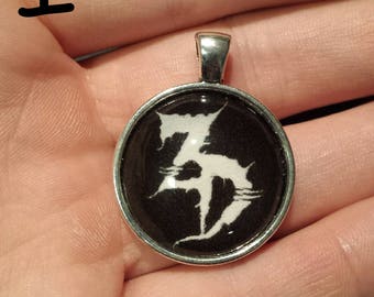 Zeds Dead Pendant. Glass Cabochon.