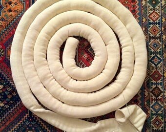 Knit tube. Tube yarn. tubular yarn. stockinette. knitted tube. knot pillow. knot cushion. diy. ice yarn. tube socks. chunky yarn. Crochet