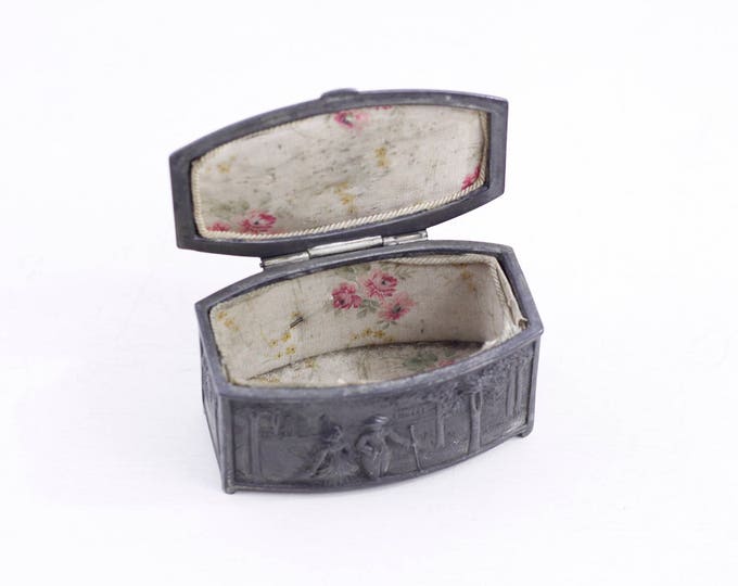 Antique pewter jewelry box, trinket box with courting couple, cast metal treasure box on feet by W B Mfg, model 425, pat pending repousse
