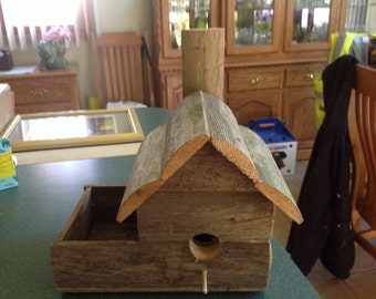 Birdhouse rustic with planter reclaimed wood fencing