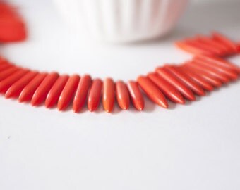10 orange "Bullets" in fine stone Howlite spikes/spikes