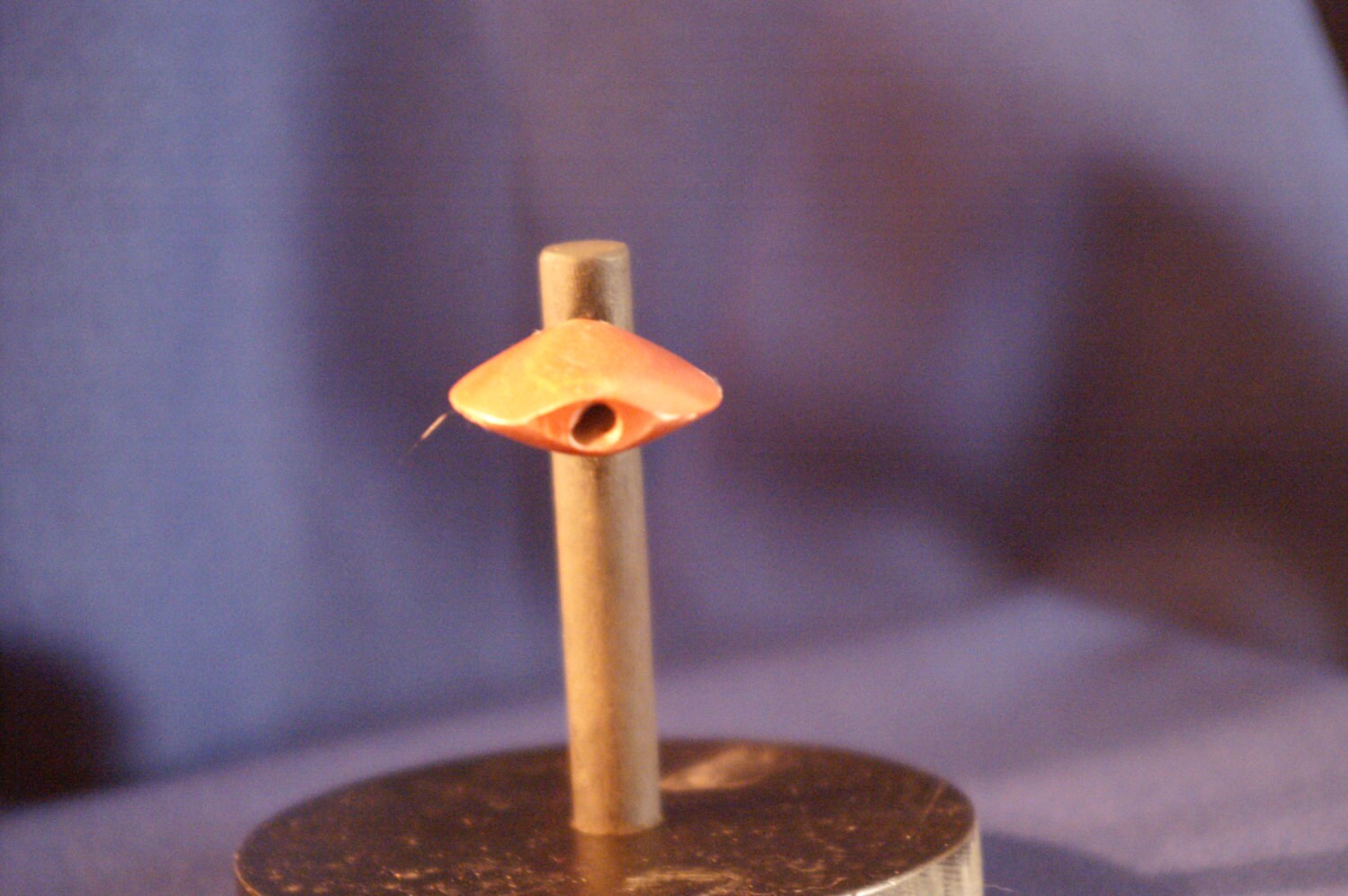 Smoking stone toke one hitter holds hand rolled joints