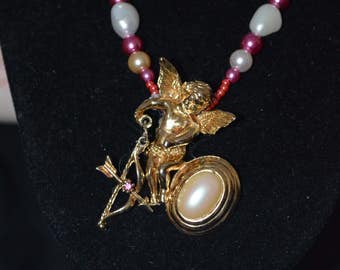 Love's Arrow-Vintage pendant and baroque and glass pearls