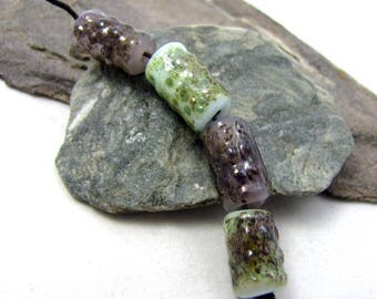 Bumpty Tubes Shiny Bumpy Textured Glass Lampwork Tubes Pastel Pale Green and Pale Opalescent Lilac with Metallic Earthy Speckles set of 4