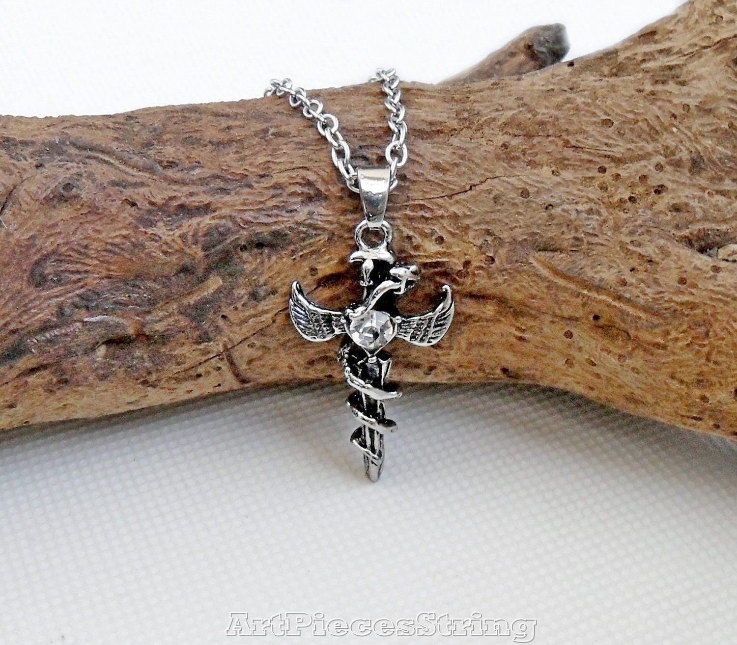 Snake cross necklace coiled serpent wing cross necklace