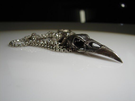 Solid sterling silver raven pendant