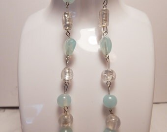 Fashion Earrings, with pale blue stones...