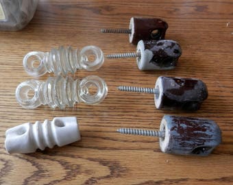 seven (7) antique electric insulaters pottery and glass