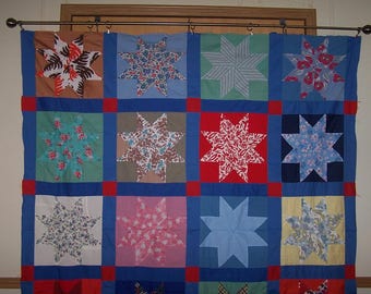 Beautiful vintage quilt top. Mostly hand stitched star pattern.