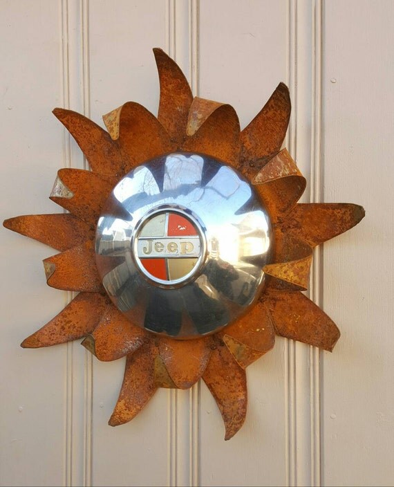 Jeep hubcap sunflower or sun rusted metal wall by MyRustedRoots