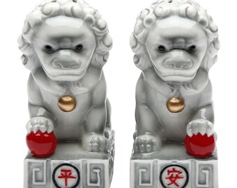 A Pair of Stone Lions with Chinese Characters Matching Salt & Pepper Shakers