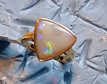 Lovely 9 carat yellow gold Australian solid trillion cut opal ring