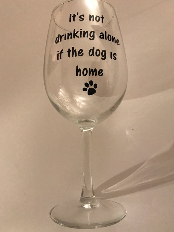 It's not drinking alone if the dog is home wine glass