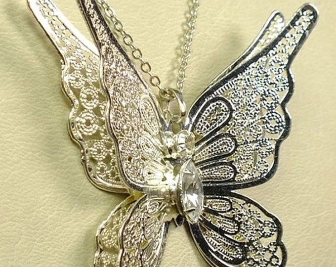 Storewide 25% Off SALE Vintage Butterfly Pendant Necklace that features intricate open work dimensional design