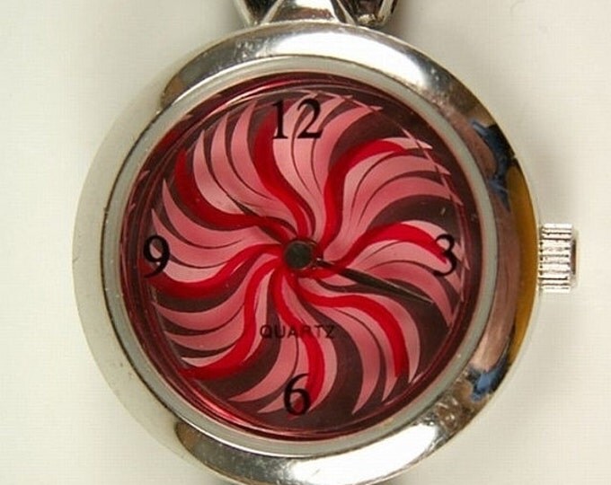Storewide 25% Off SALE Lovely Vintage Ladies Red Pinwheel Face Quartz Watch Featuring Beautiful Circular Swirl Design And Lovely Silver Tone