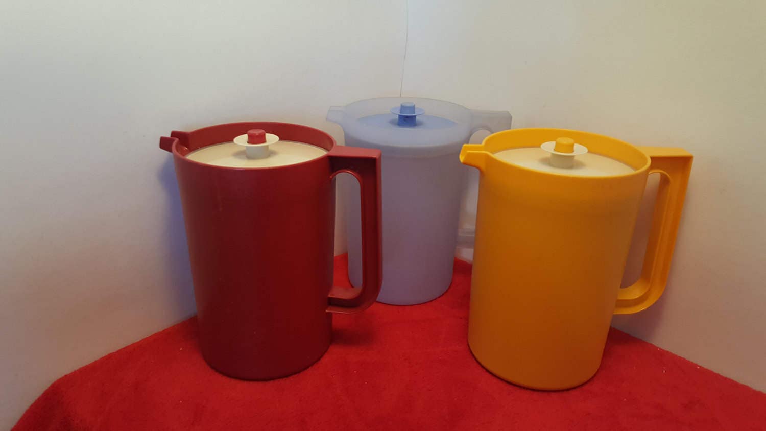 vintage tupperware plunger pitchers for sale / sheer blue