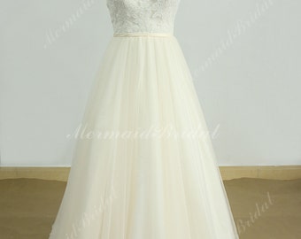 Romantic open back lace tulle wedding dress with pale blush skirt