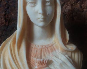 virgin Mary mother of jesus weeping statue