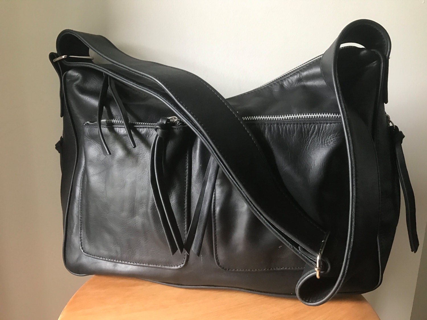 Curved hobo style handmade leather bag.Extra wide crossbody