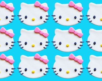 12 edible Hello Kitty cupcake toppers