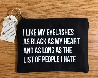 An 'I Like My Eyelashes As Black As My Heart And As Long As The List Of People I Hate' makeup bag
