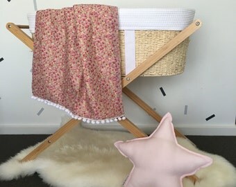 Dark pink floral baby pom pom blanket
