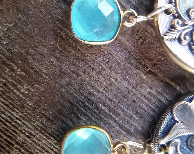 Beautiful Unmatched Vintage Buttons are the Focal Point of These Earrings with a dangle of Blue Chalcedony